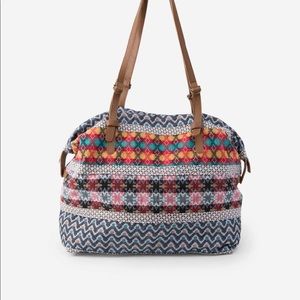 Noonday Collection Kathmandu bag leather handles